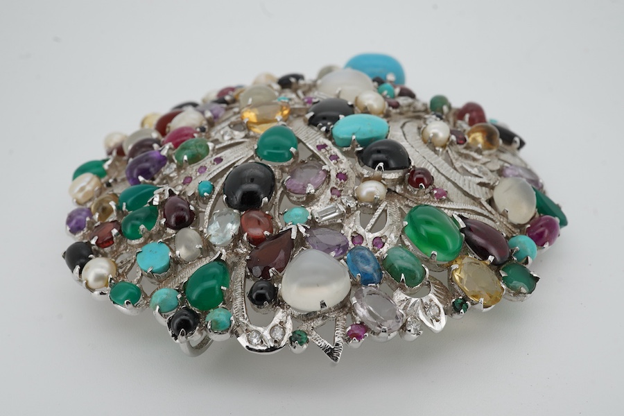 A large recent white metal (stamped 92.5) and multi gen set circular brooch, 89mm.